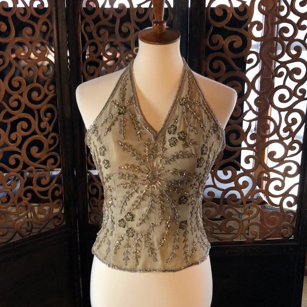 Elegant beaded halter top, laces up the back.